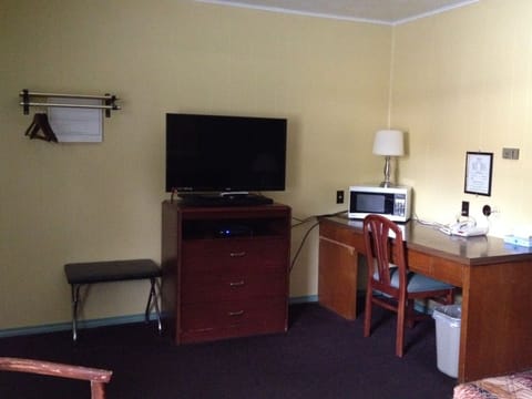 Standard Room, 2 Double Beds | Living area | 40-inch flat-screen TV with premium channels, TV