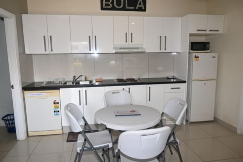 Deluxe Apartment | Private kitchen | Fridge, microwave, stovetop, rice cooker