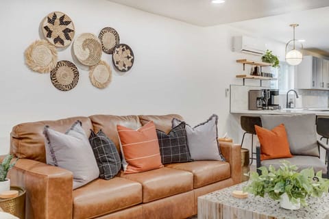 Our living room is just steps away from the kitchen. Enjoy the perfect blend of relaxation and culinary delights in this well-connected space.