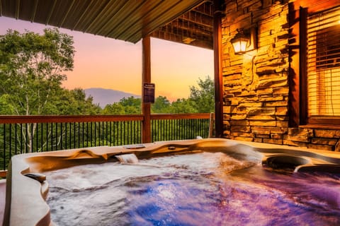 Pamper yourself in the hot tub with sweeping panoramic views of the Smoky Mountains