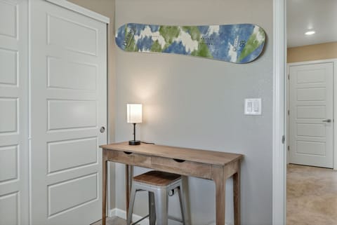 Dedicated workspace and wardrobe available at bedroom 5