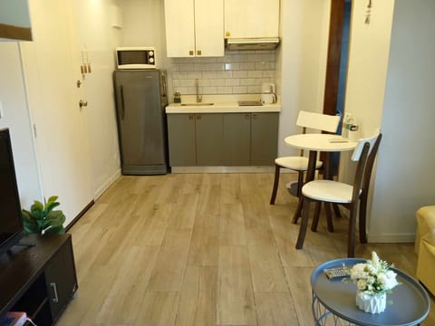 Premium Loft | Private kitchen | Full-size fridge, microwave, rice cooker, cleaning supplies