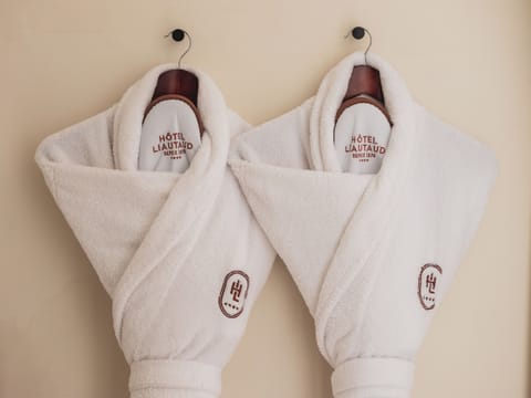 Shower, hair dryer, bathrobes, towels