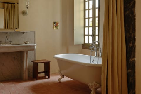 Suite, 1 King Bed | Bathroom | Designer toiletries, hair dryer, bathrobes, slippers