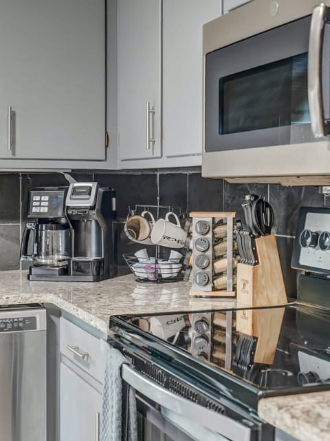 In our kitchen, you'll find the convenience of a Keurig, ready to brew your favorite coffee or tea at the touch of a button.