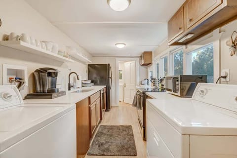 The Washer and Dryer Conveniently Located in the Kitchen. Never Leave Your Clothes Unwashed!