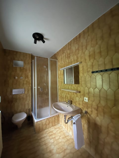 Basic Apartment | Bathroom | Hair dryer, towels