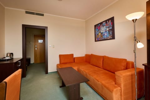 Apartment, Balcony | Living area | 60-cm LCD TV with satellite channels