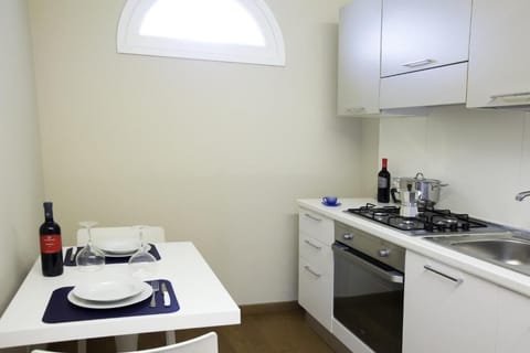 Deluxe Studio | Private kitchen | Fridge, electric kettle