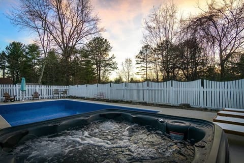The backyard is built for fun, relaxing, and spending time with family/friends. A well maintained hot tub, pool with loungers, and a nice fire pit area with seating.