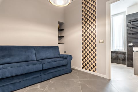 Deluxe Double or Twin Room | Living area | 30-inch Smart TV with digital channels, printers