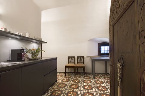 Junior Suite | Living area | 24-inch Smart TV with satellite channels, heated floors