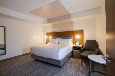 Suite, 1 King Bed, Accessible (Communications) | Hypo-allergenic bedding, in-room safe, desk, blackout drapes