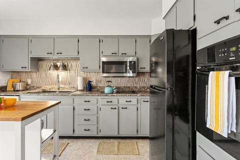 Spacious kitchen complete with modern appliances