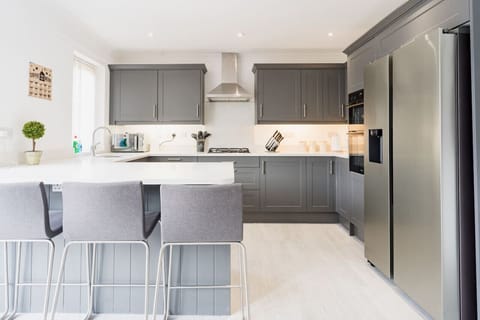 Kitchen/Dining Room: every amenity you need to self cater during your stay at Lydiate is available in the modern kitchen.