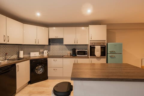 The Kitchen: cook up a storm in our well equipped kitchen, featuring all the amenities you will need.