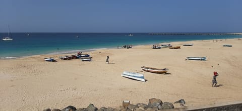 Beach nearby, white sand, 2 beach bars