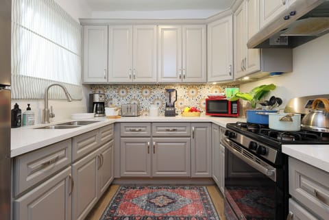 Cooking up a storm in this well-equipped kitchen.