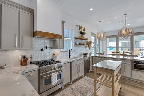 Ignite your culinary passions in our fully stocked kitchen, complete with a sleek gas stove for gourmet creations