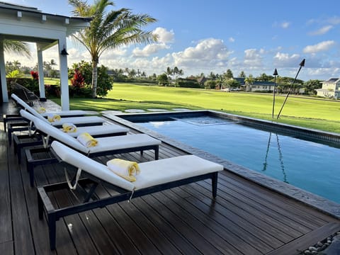 Plenty of seating around pool and bar.
