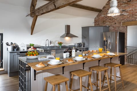 Well-equipped, bespoke kitchen area with all that you need to create meals for family and friends