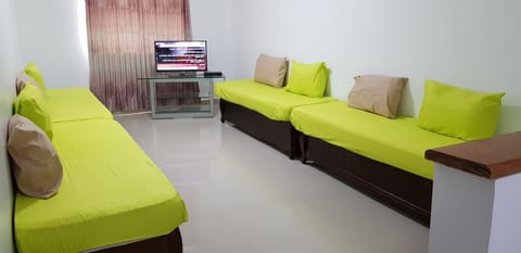 Standard Apartment | Living area | 32-inch LED TV with satellite channels