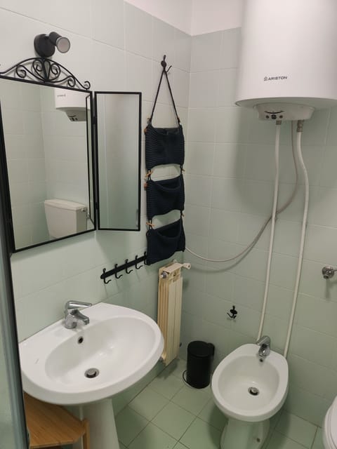 Bathroom | Shower, rainfall showerhead, hair dryer, bidet