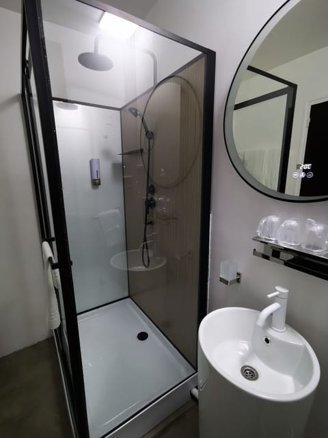 Standard Double Room | Bathroom | Shower, hair dryer, towels