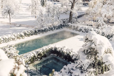 Indoor pool, 2 outdoor pools, open 6:30 AM to 10:00 PM, pool umbrellas