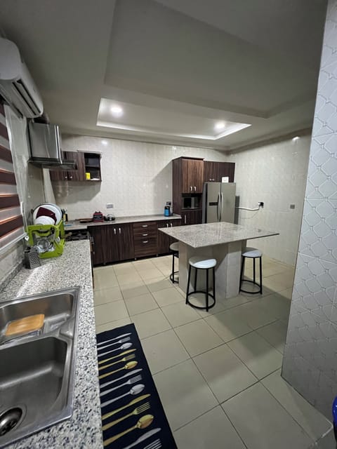 Executive Duplex, 4 Bedrooms, Non Smoking | Private kitchen | Fridge, microwave, stovetop, electric kettle