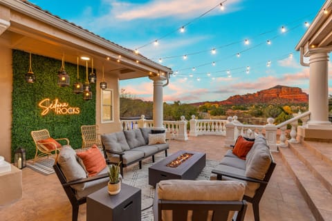 - Sedona outdoor patio with cozy seating and glowing fire pit - String lights create a warm atmosphere for evening relaxation - Scenic red rock views make this outdoor space unforgettable