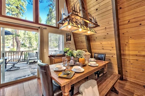 Dining table on main / mid level (seats 8). There’s also bar seating for 3 and another small table that seats 4 adjacent to living area.