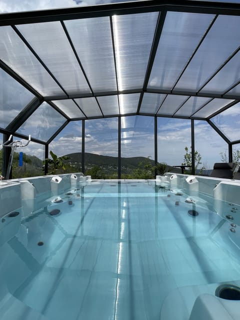 Indoor pool, outdoor pool, open 9:00 AM to 9:00 PM, pool umbrellas