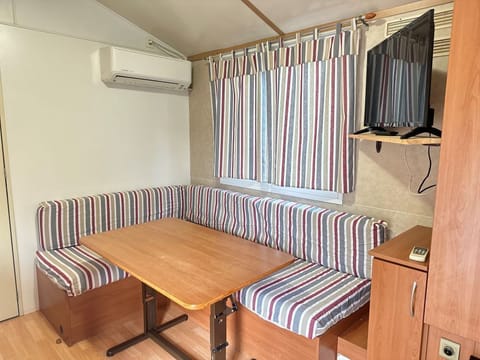 Basic Mobile Home, 2 Bedrooms, Non Smoking, Private Bathroom | Living area | 32-inch TV with satellite channels