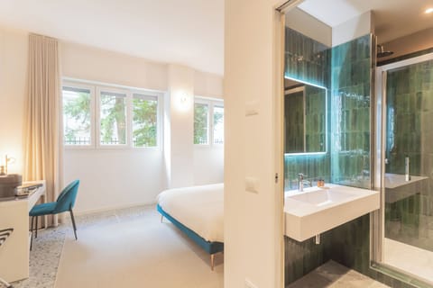 Design Double Room, 1 Queen Bed, Private Bathroom, Courtyard View | Premium bedding, down comforters, in-room safe, individually decorated