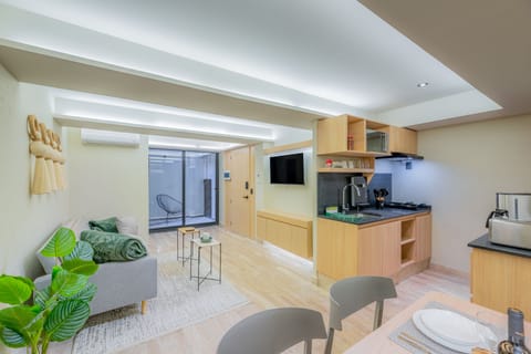 Comfort Apartment | Private kitchen | Full-size fridge, microwave, espresso maker, coffee/tea maker