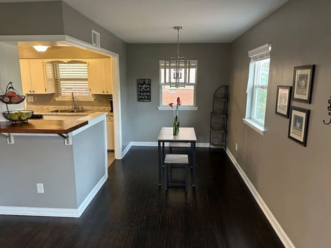 Bright dining area flows seamlessly into the kitchen