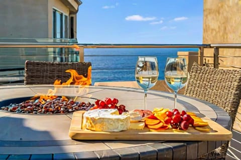 Ocean view from your balcony! Disclaimer: Charcuterie is for photo purposes only. Not included with stay.