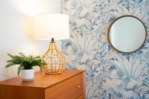 Fun meets function in this stylish bunk bed room, perfect for kids or young adults to unwind after a day at the beach. Twin bed on top and full bed on bottom to comfortably sleep 3.