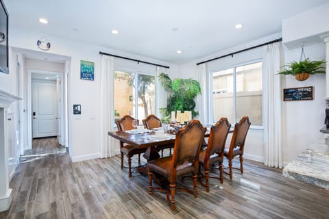 Dining table with 8 chairs. Hope you will book your next family reunion with us