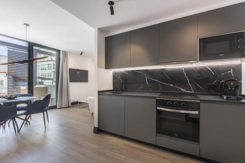 Luxury Apartment | Private kitchen | Fridge, microwave, oven, stovetop