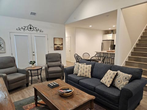 Family room look at back door and dinning table area.