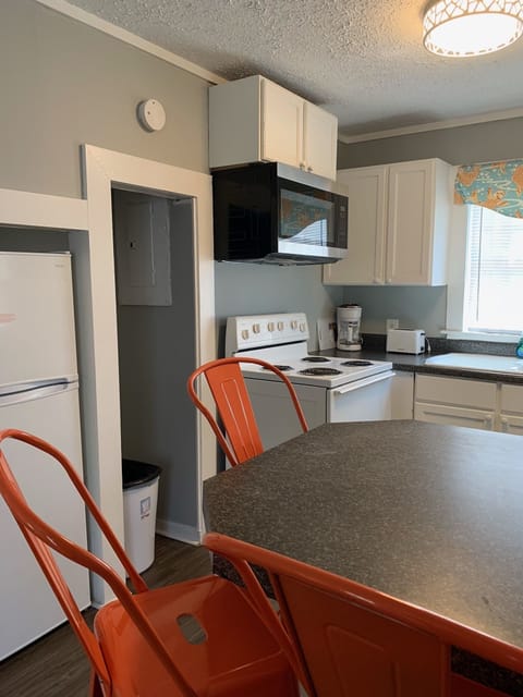 Flip Flop Cottages, 2 Bedroom, 2 Full Beds, 1 Bath with Front Porch | Private kitchen | Fridge, microwave, oven, stovetop