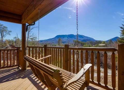 Pigeon Forge Vacation Rental "Magic Views" - Main level back deck with swing