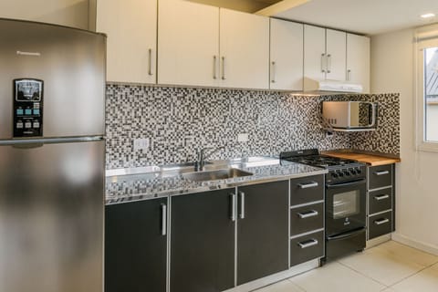 Apartment | Private kitchen | Fridge, microwave, stovetop, coffee/tea maker