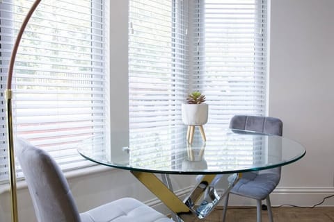 Bay window dining table for two. Beautiful natural light.