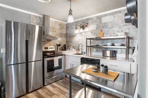 Gleaming brand-new appliances make mealtimes a pleasure, including a dishwasher for easy post-meal cleanup!