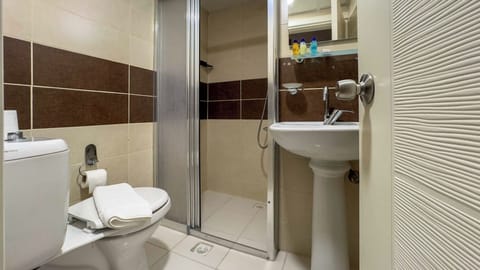 Shower, free toiletries, hair dryer, slippers