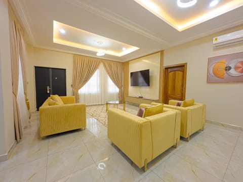 Luxury Apartment, 2 Bedrooms | Living area | 50-inch Smart TV with satellite channels