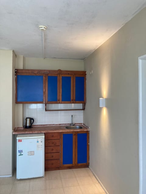 Grand Condo, 2 Bedrooms | Private kitchenette | Fridge